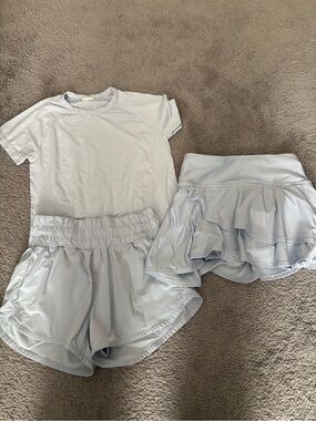 Bundle of girls size medium Light Blue Active Tee & Shorts Set and Ruffled Skort